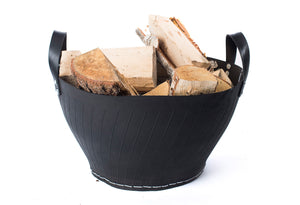 Rubber basket with wood against white background.